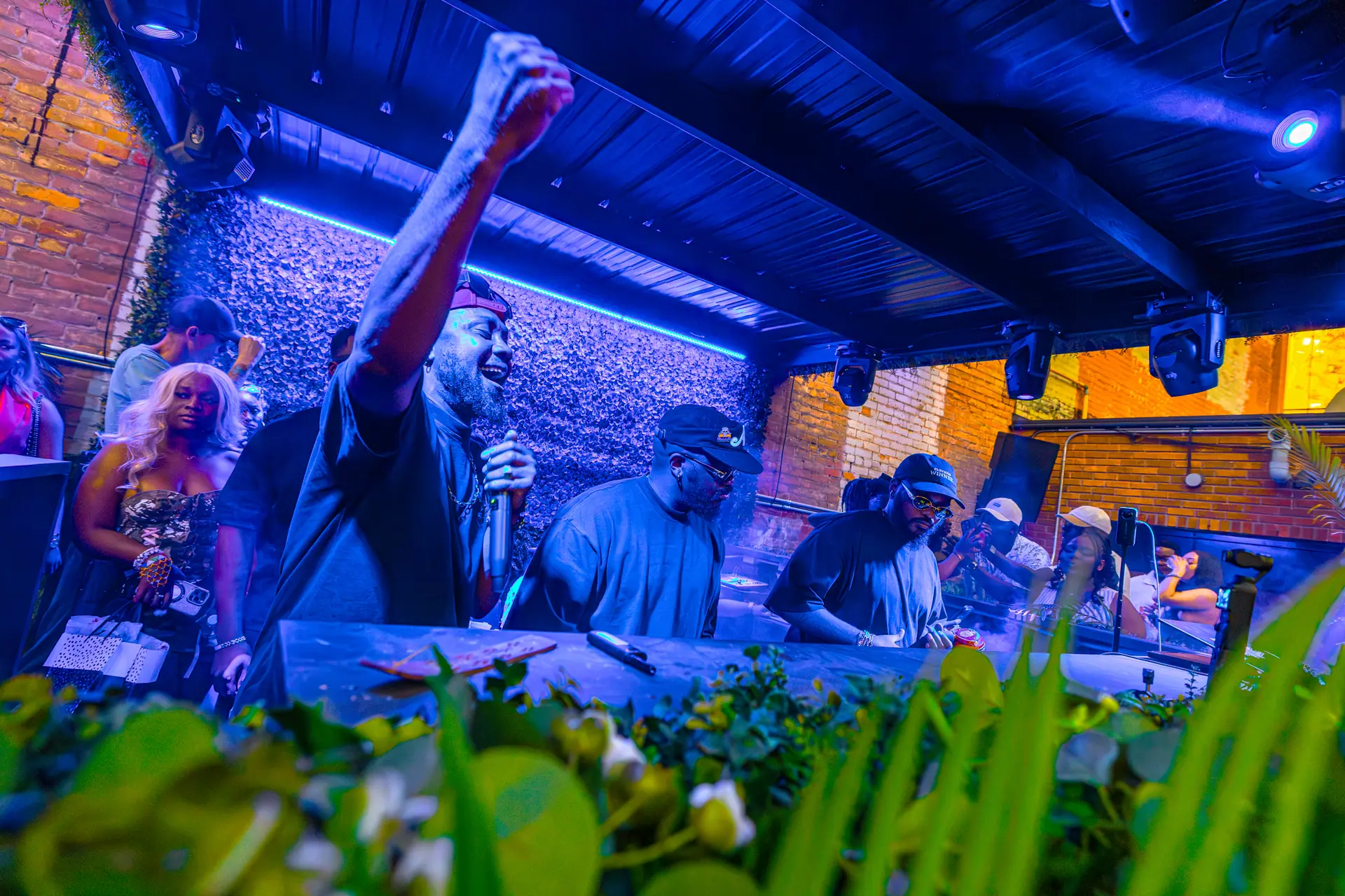 Crowd energy under warm event lighting